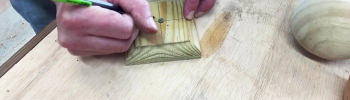 Attach the legs to the post cap plate. Stack legs together, mark a circle around the center, and align with the cap plate markings. Pre-drill, glue, and screw the top two legs to the plate. Flip, and repeat for the bottom two legs.