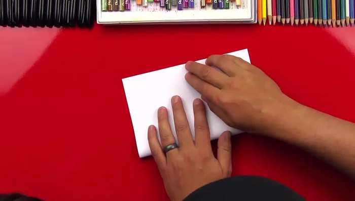 Fold it in half again.