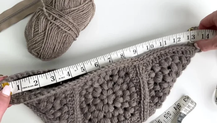 Measure the desired length of the zipper on your bag (e.g., 13 inches) and mark it.