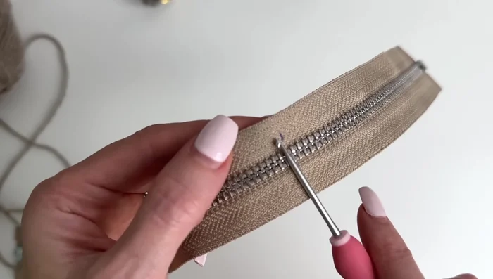 Repeat step 3 for the other side of the zipper.