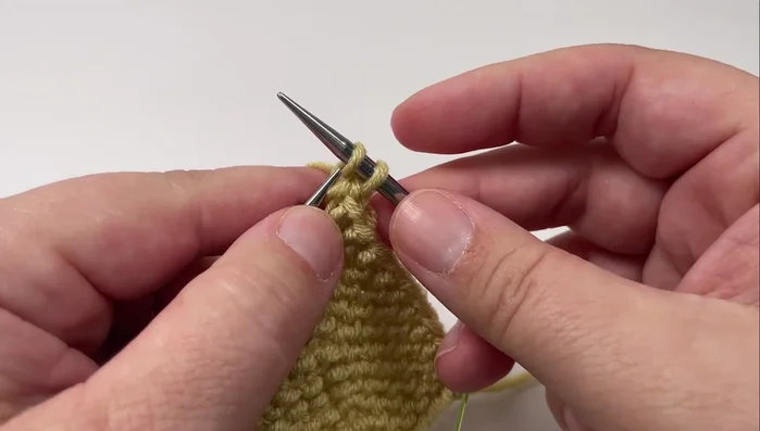 Knit the last stitch.