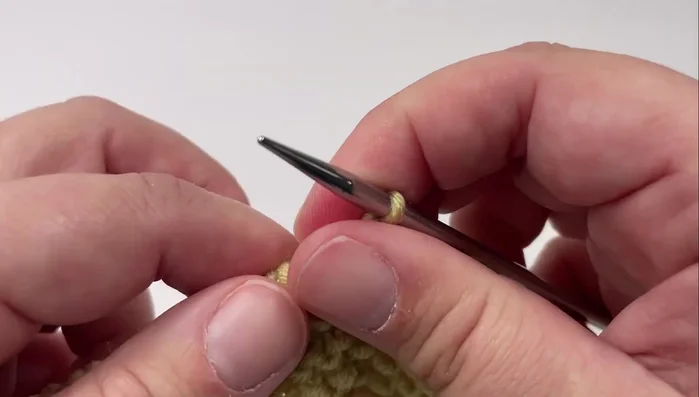 Knit the last stitch.