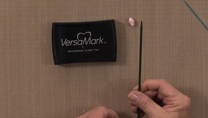 Heat the embossing powder with a heat tool to melt and create a shiny, durable finish. You can repeat steps 6 & 7 for an extra shiny coat.