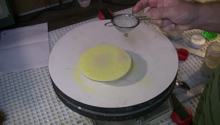 Use a wet sponge to blend and create an organic texture on the powder.