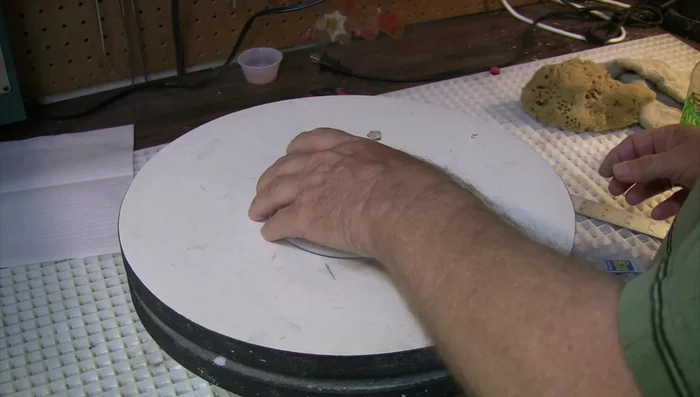 Prepare glass circles (5-inch diameter). Stack clear and white circles and glue them together.