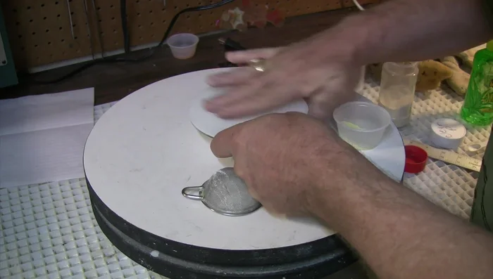 Use a wet sponge to blend and create an organic texture on the powder.