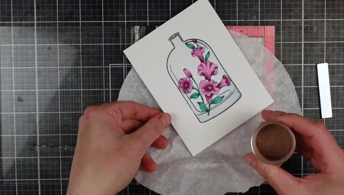 Stamp and heat emboss the sentiment from the Versatile Vases set using rose gold embossing powder.