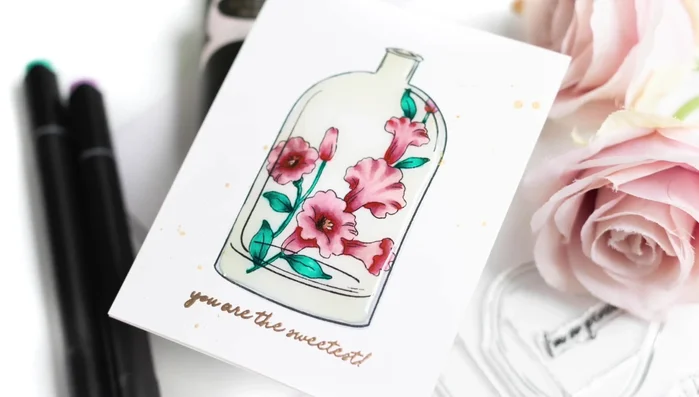 Mount the finished card onto a notecard. Add optional antique gold shimmer spray to the background to complement the gold embossing (optional).