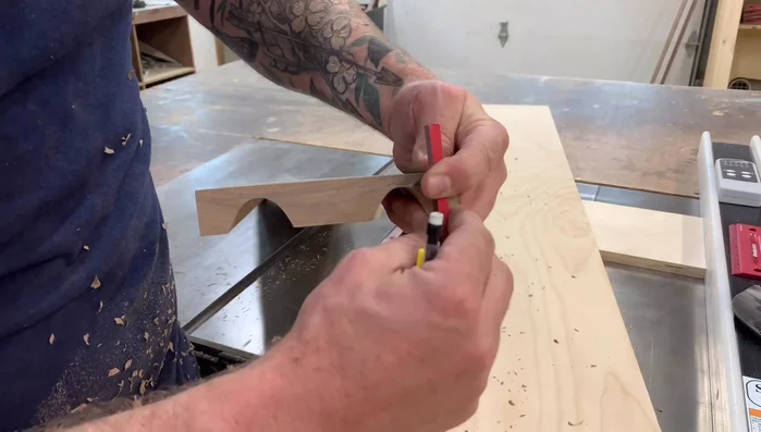 Redraw a line 1/4 inch from the cove. Draw a reference line for the pole shape.