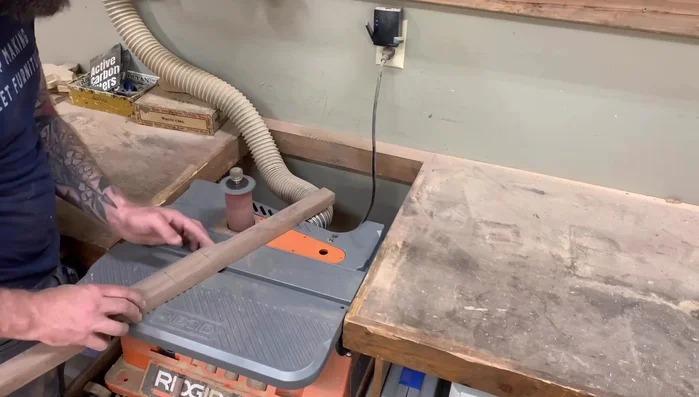 Finish and clean up: Use an oscillating spindle sander to clean up excess material. Cut the finished pull to a 1/4 inch thickness. Glue to a drawer face and trim.