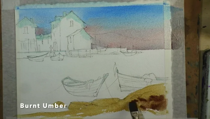 Adding Payne's grey and scraping/dragging with a plastic card to create rock textures.