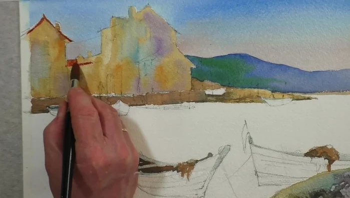 Painting roofs with a mix of cadmium orange and burnt umber.