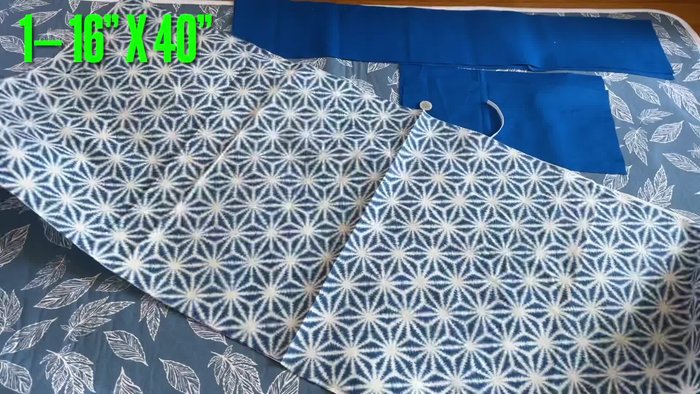 Prepare the fabric pieces: Main body (16 inches x 40 inches), Pocket (6 inches x 12 inches x 2), Strap (5 inches x 26 inches)