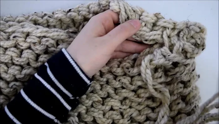 Gently tighten the stitches as you go to keep the seam even and neat, or tighten the seam at the end.