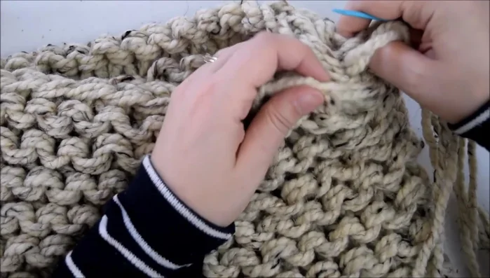 Repeat steps 3 and 4 along the entire top and bottom edges, creating a continuous seam.