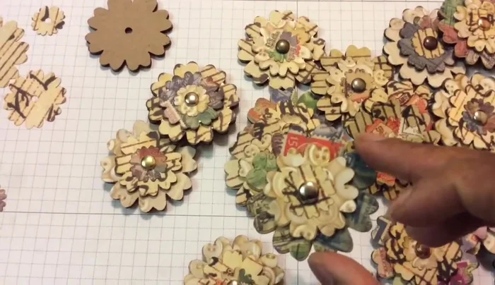 Fasten the layers together using brads in the center.