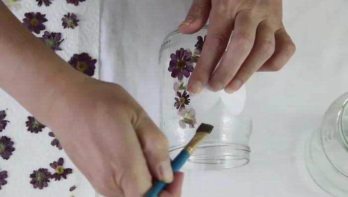 Once the area around the heart is covered, remove the paper template.