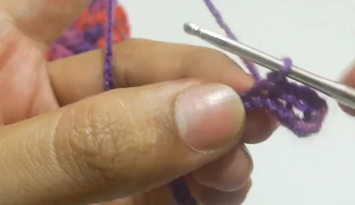 Attach a bead to one end to use for fastening the clasp.