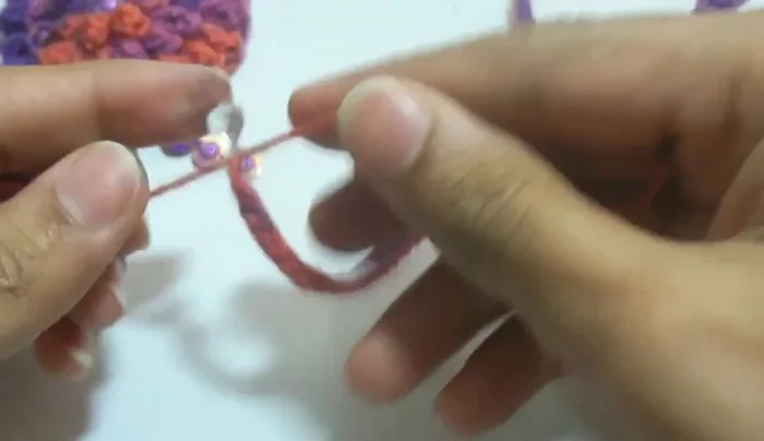 Attach a bead to one end to use for fastening the clasp.