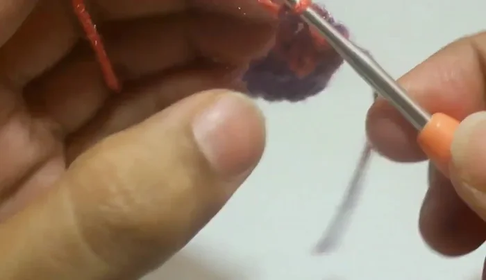 Work a slip stitch through the first three chain stitches to complete the first round.