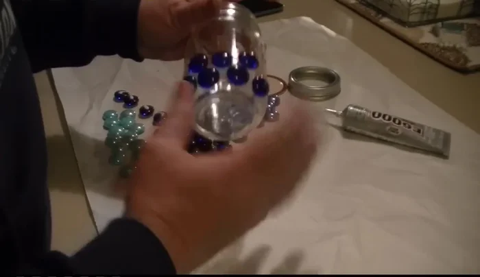 Work in small sections: Focus on a small area at a time to avoid the beads sliding around before the glue sets. Hold each bead in place until it starts to stick.