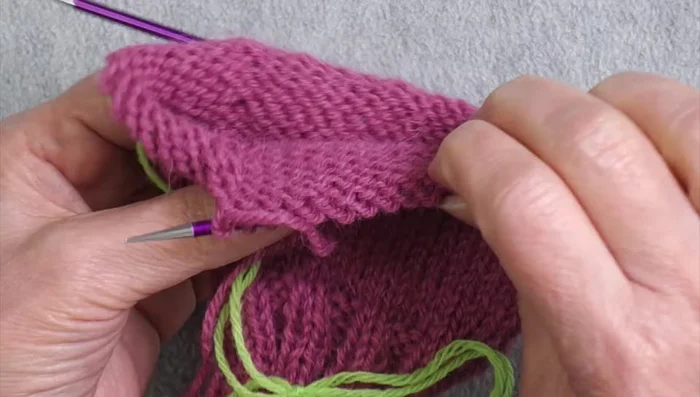 Knit Hand Portion: Knit in the round to the desired length for the hand portion. Create ribbing for the hand's top edge by subtracting at least a half-inch for the ribbing section.