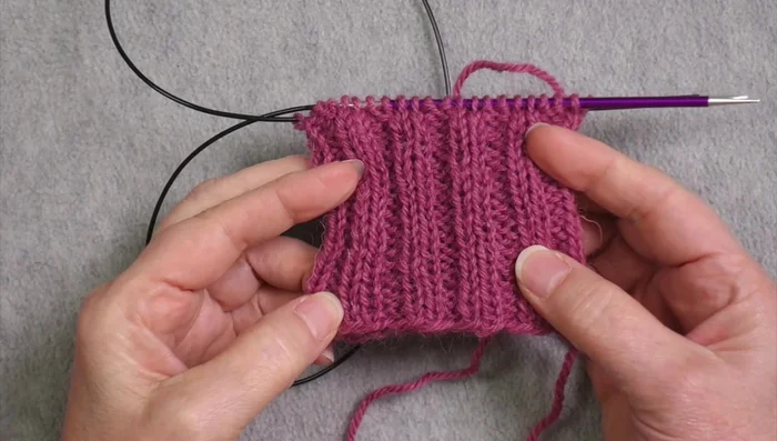 Knit the Cuff: Cast on calculated stitches and knit ribbing (e.g., k2, p2) to desired cuff length (typically 2-3 inches).