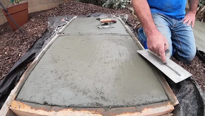 Lightly trowel and edge the surface again. The goal is a perfectly smooth finish.