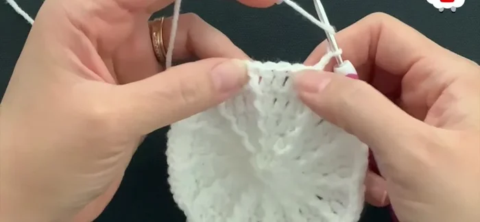 Continue rows, increasing by 12 stitches per row until you reach desired hat length (minus about 3cm/1.5 inches for the brim).