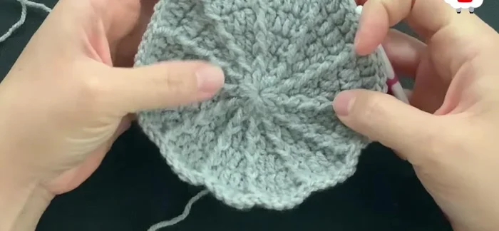 Continue rows, increasing by 12 stitches per row until you reach desired hat length (minus about 3cm/1.5 inches for the brim).