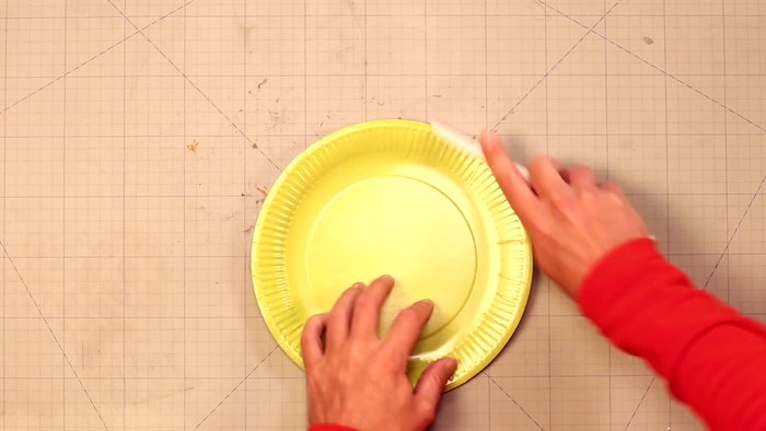 Fold the plate and cut it in two.