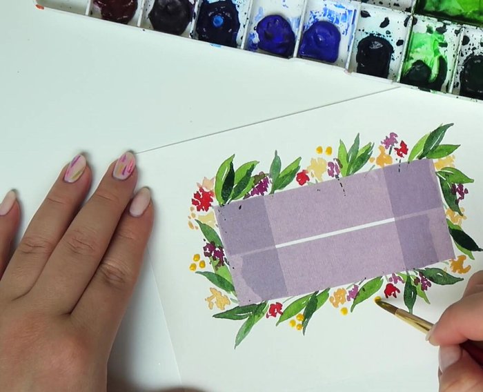 Add brighter yellow dots around the wreath to resemble berries.