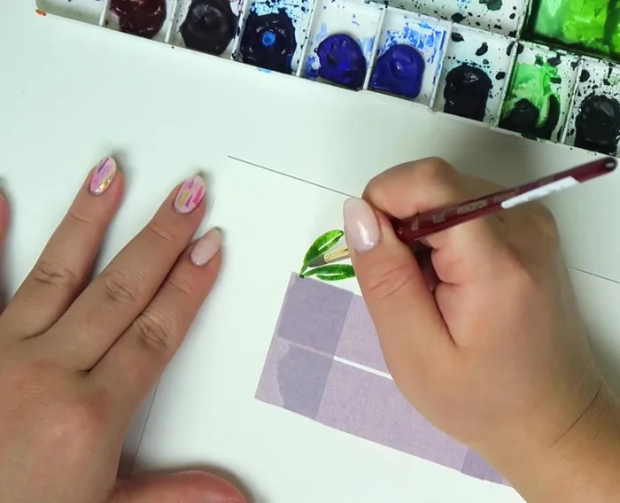 Fill any remaining negative space with more leaves, using a darker shade of green to add depth.