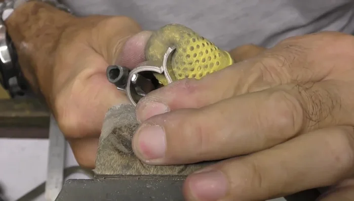 Use rubber thimbles to carefully shape the crossover.