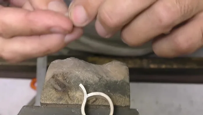 Adjust the angle if needed by reheating and repositioning.