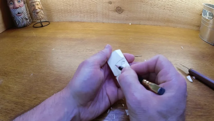 Shape the hat brim: Flatten out the hat brim and remove saw marks.