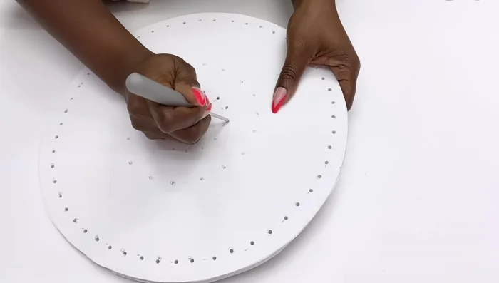 Cover the foam boards with gold contact paper.