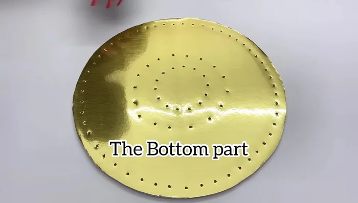 Secure the strings to the top foam board using tape and a hot glue gun.