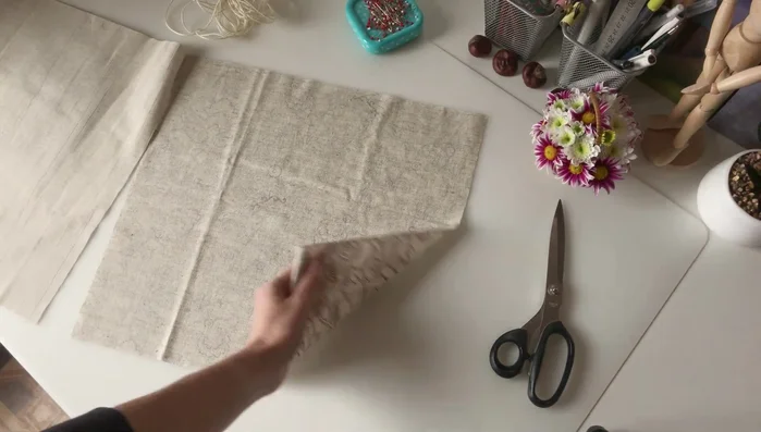 Reinforce the main detail: Place the printed main detail on top of the interfacing and iron to adhere.