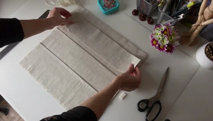 Assemble the cap: Stitch the two cap details together face-to-face, leaving the top open. Trim excess fabric, turn right side out, and iron.