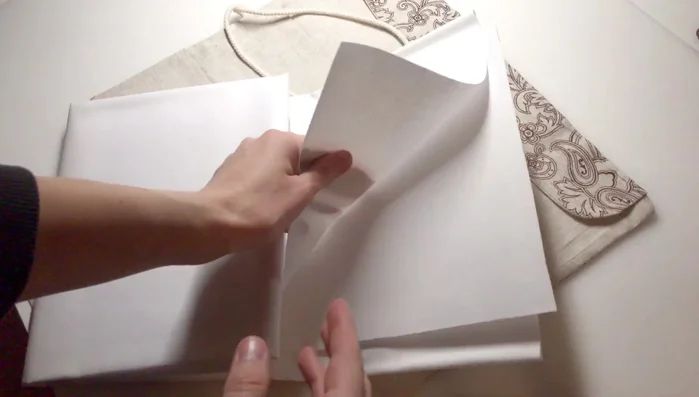 Insert stiffening: Place a piece of thick interfacing inside the case to maintain its shape. This is crucial for keeping the case from collapsing when empty.