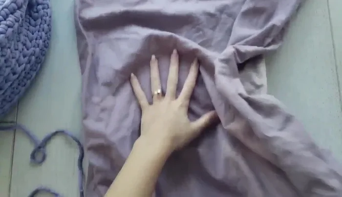 Seam up the remaining portion of the pouf, using a slip stitch to join the back loops of the stitches. Close any remaining holes by weaving in extra yarn.