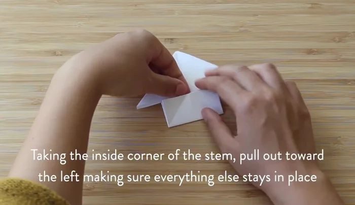 Make the legs skinnier by folding them at an angle outward.