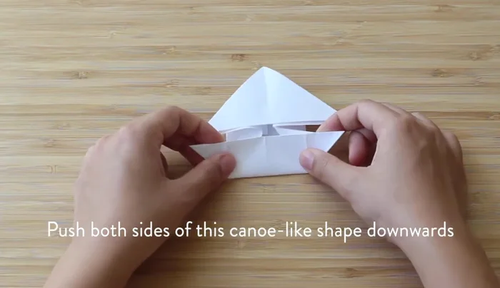 Make the legs skinnier by folding them at an angle outward.