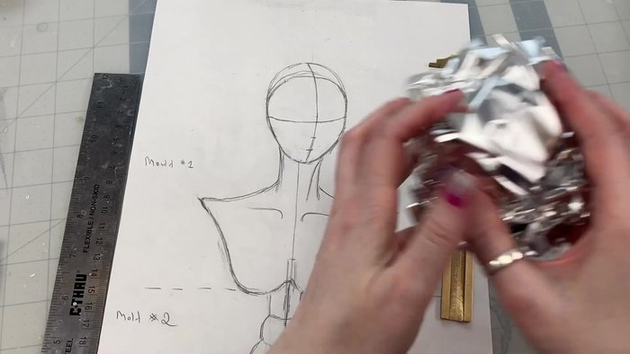 Apply polymer clay over the tin foil ball using liquid Sculpey as adhesive.