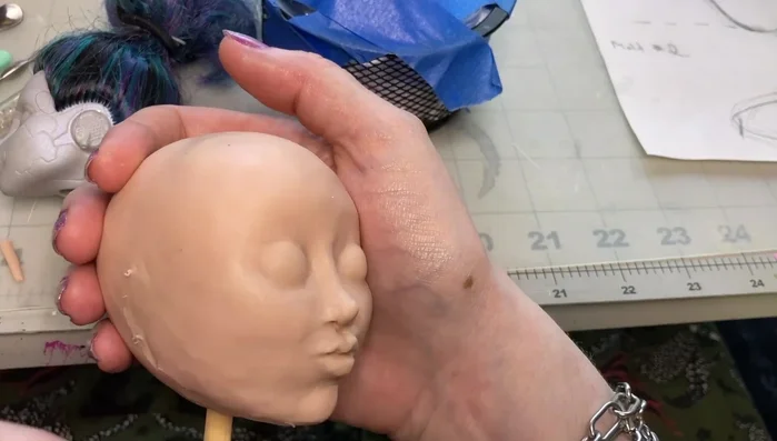 Carve out the jawline to achieve the desired shape.