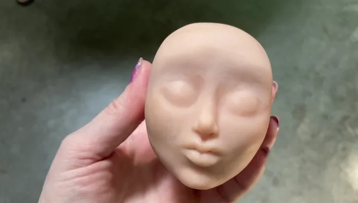 Bake the clay head according to the manufacturer’s instructions.