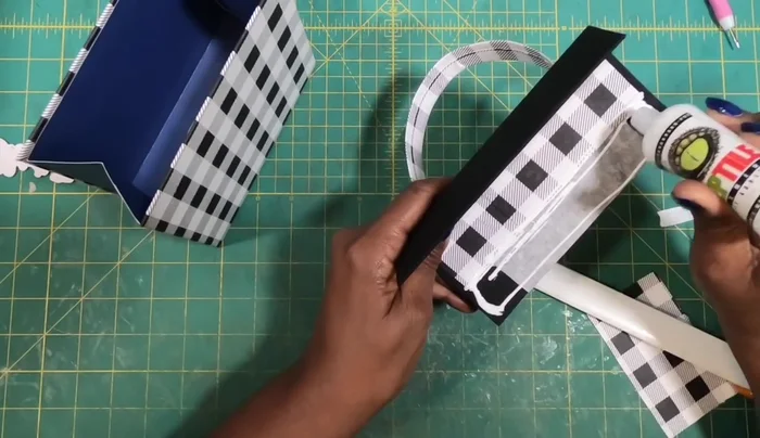 Attach the Lid: Glue the lid to the top of the purse body.