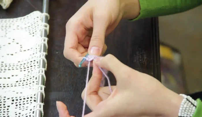 Ensure you end with a single crochet in the last stitch to keep the edges straight. Turn your work and chain three.