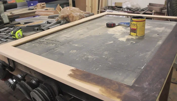 Stain and seal the frame with Minwax dark walnut wood stain and wipe-on polyurethane.